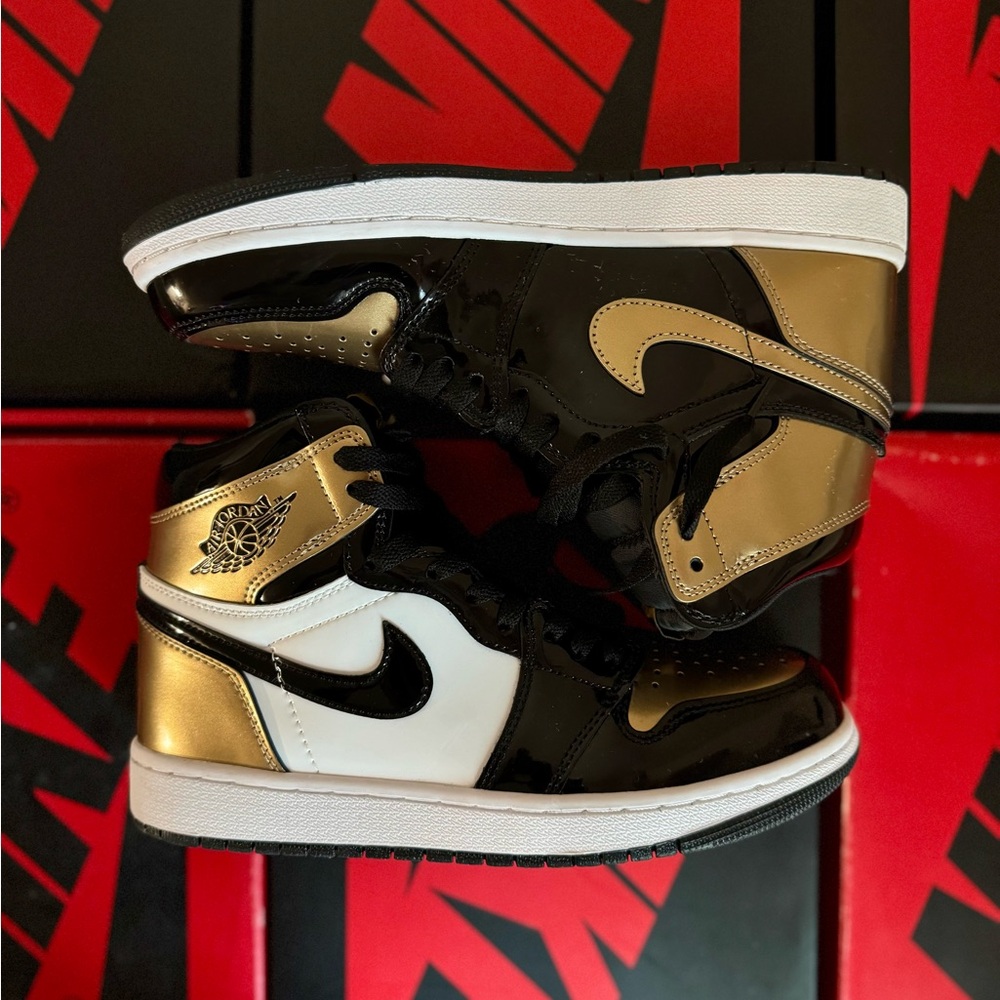 Nike Air Jordan 1 High Black and Gold Sneakers